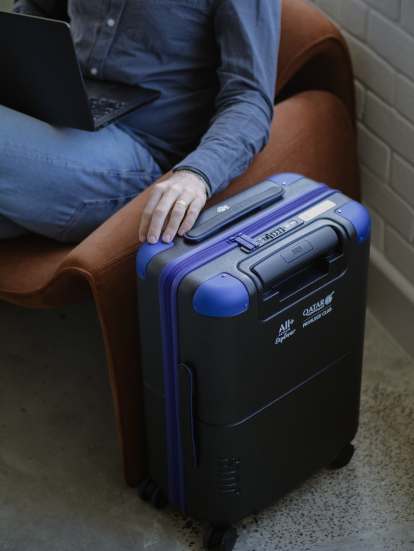 July × The Flights Club carry-on with laptop