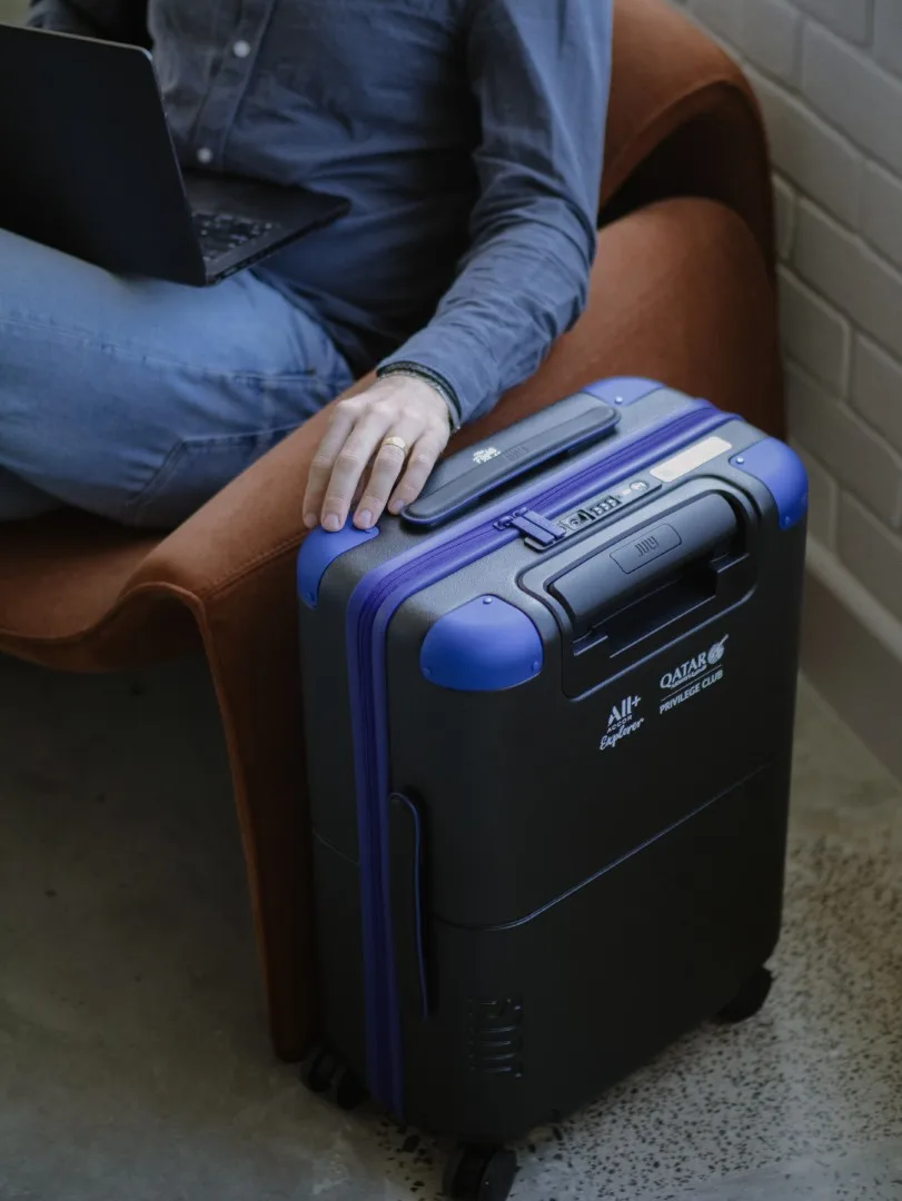 July × The Flights Club carry-on with laptop